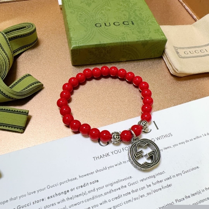 G*u*i bracelets